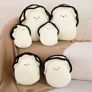 Groupe de mignons coussins en peluche huître de différentes tailles sur un plaid doux
