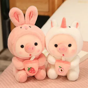 Lindos peluches de cerdito bubble tea con capuchas de conejo rosa y de unicornio