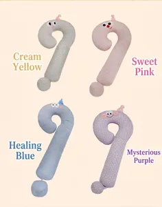 Four colorful question mark plush body pillows with cute big eyes for sleeping comfort