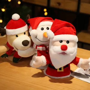 Plush Christmas hand puppets set featuring Santa, snowman and reindeer on wooden table