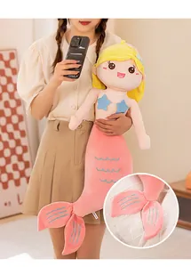 Cute plush mermaid doll for girls with pink tail and close-up view of tail stitching.