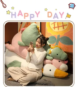 Large cute duck and dinosaur plush long pillows used as a cozy backrest at home