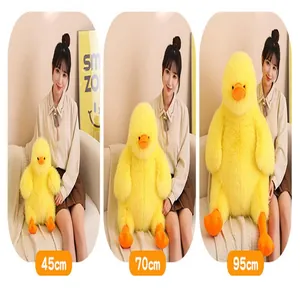 Comparison of three sizes (45cm, 70cm, 95cm) of the fluffy yellow duck plush toy