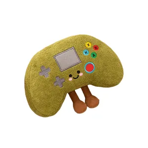 Adorable green game controller shaped plush toy with embroidered buttons and small legs