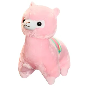 Soft pink alpaca plush toy featuring a colorful rainbow saddle decorative mascot