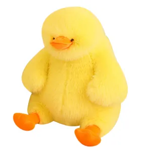 Cute fluffy yellow duck plush toy with soft long fur, adorable round stuffed animal