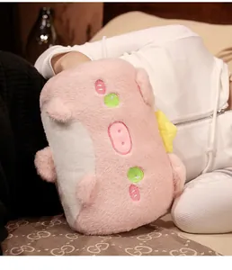 Cute pink pig plush hand warmer pillow with soft fuzzy texture for cozy winter comfort