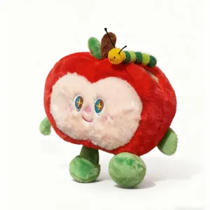 Adorable red apple plush toy with a cute green caterpillar charm for bag decoration