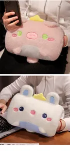 Detailed view of cute pink pig and white rabbit plush hand warmer pillows for cozy winter