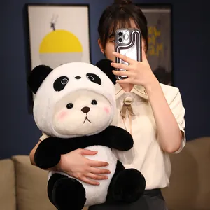 Soft panda-themed teddy bear plush toy for children shown in a lifestyle setting.
