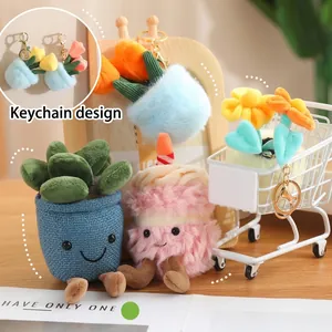 Soft plush tulip and succulent plant pot keychain charms with cute smiling faces