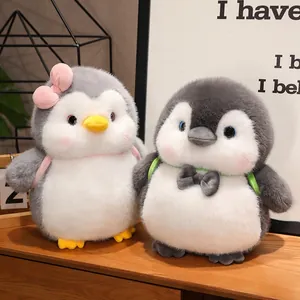 Adorable plump penguin plush toys with bow and backpack for kids soothing