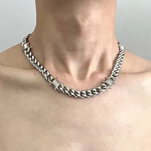 Men's silver Cuban link necklace with unique barbed wire thorn accents in hip-hop style