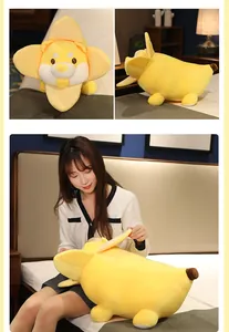Adorable soft banana dog plush toy held by a person to demonstrate its large size