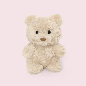 Soft cream-colored teddy bear plush toy for children's birthday gift with fluffy texture