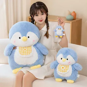 Cute blue penguin plush toy collection in various sizes with yellow gingham bib.