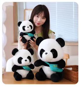 Detail view of adorable giant panda plush toys in different sizes with green messenger bags