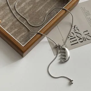 Unique silver comb pendant necklace with snake chain made of durable stainless steel