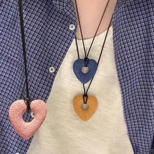 Large volcanic stone heart pendant necklace with black cord for women