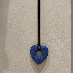 Large blue lava stone hollow heart pendant necklace with adjustable black wax cord