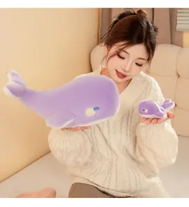 Soft purple whale plush toy set featuring a large pillow and a small keychain detail