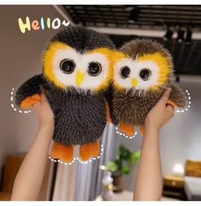 Close-up of two realistic big-eye owl plush toys with soft fluffy fur and orange feet.