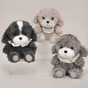 Set of three cute fluffy puppy plush toys in grey and beige tones on clear stands
