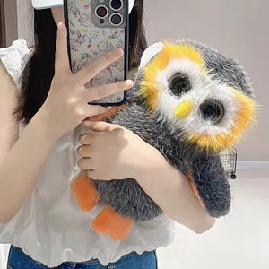 Adorable lifelike plush owl toy with big glass eyes and fluffy grey fur, perfect for kids