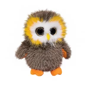 Cute plush owl toy with large eyes and realistic brown fur on white background