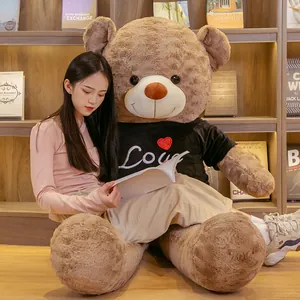 Large brown teddy bear plush toy wearing a black Love t-shirt, perfect birthday gift