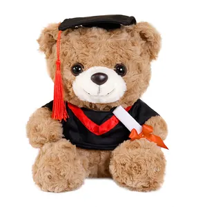 Brauner Abschluss-Teddybär Plüschtier mit schwarzer Robe und einer roten Quastenkappe