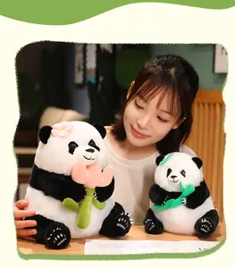 Close-up detail of adorable panda plush toy with flower held by model in home setting
