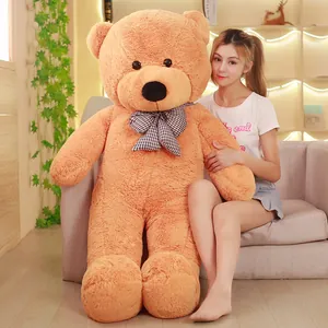 Giant brown plush teddy bear with checkered bow, perfect birthday gift for girls