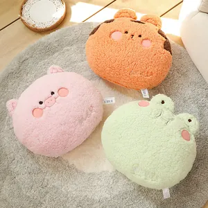 Set of three cute animal Sherpa fleece plush pillows displayed on a cozy gray round rug