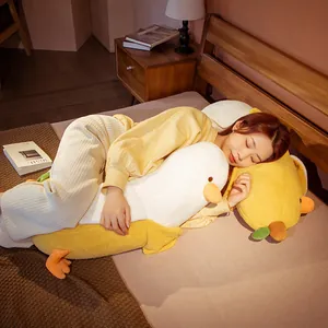 Soft banana duck plush pillow for side sleeping, cozy long stuffed toy for bedroom decor.