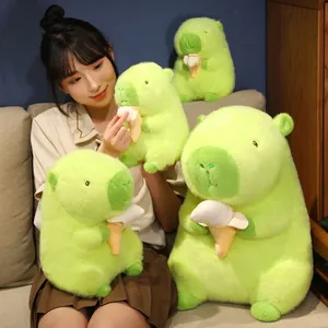 Cuddly green capybara plush toy holding a peeled banana, soft ugly-cute animal doll