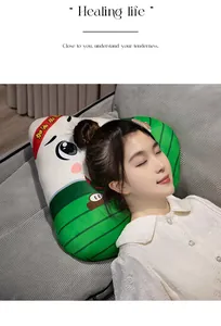Detail of a Zongzi plush pillow being used by a model on a comfortable sofa