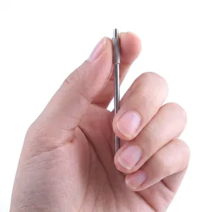 Portable stainless steel toothpick with knurled non-slip handle for oral care.