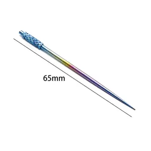 Close-up of rainbow titanium portable metal toothpick needle with 65mm measurement scale