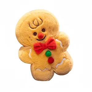Lebkuchenmann Plüschtier mit Rentiergeweih und roter Fliege für die Weihnachtsdekoration