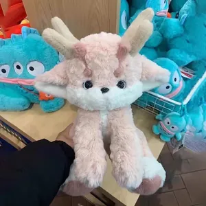 Adorabile peluche di drago rosa morbido mascotte dell'anno del drago per la decorazione