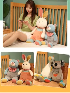 Detail view of cute plush rabbit, bear, and koala toys in a cozy home setting