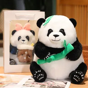 Cute giant panda plush toy holding bamboo stalk with matching window gift bag set