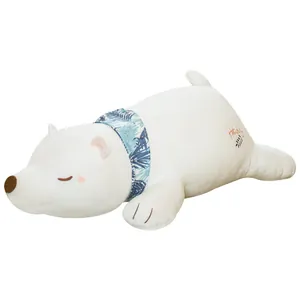 Sleeping white polar bear plush toy with tropical leaf scarf and Holiday embroidery