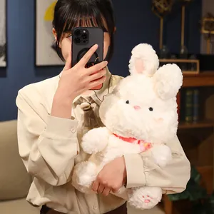 Adorable white plush rabbit toy with fluffy fur and a cute red flower collar decoration