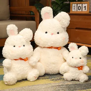 Three cute milk cap white bunny plush toys in various sizes for home decoration