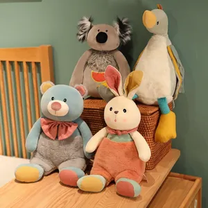 A collection of cute animal plush toys including a rabbit and bear doll for children