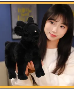 Detailed view showing the soft texture and realistic features of the black goat plush toy