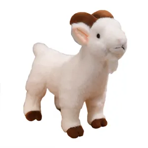 Realistic white mountain goat plush toy with brown horns and very soft fur texture.
