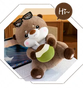 Simpatico peluche di lontra marrone con occhiali pixel e una morbida noce di cocco decorativa